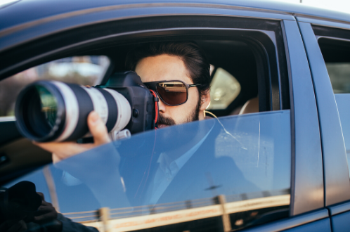 Investigator conducting discreet surveillance